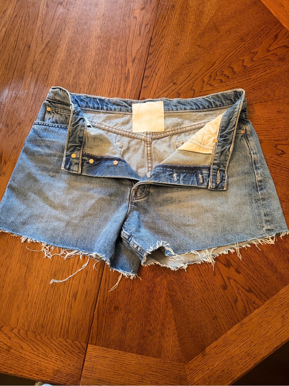 MOTHER Medium Blue Denim Cutoff Shorts with Frayed Hem
